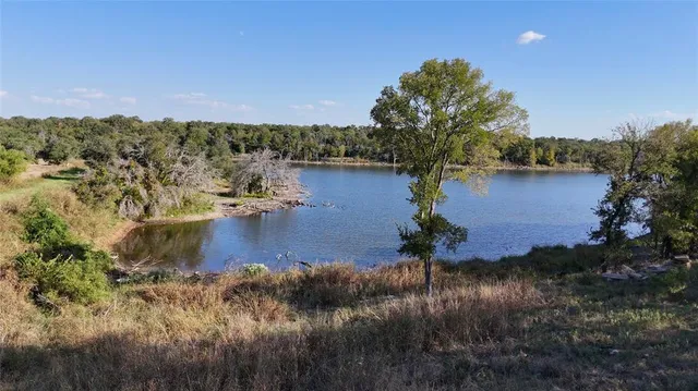 a view of a balcony with an ocean