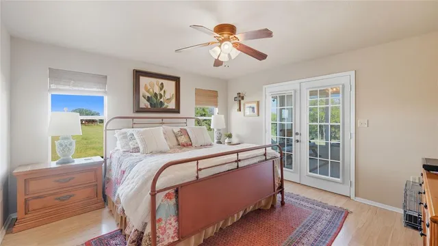 a bed room with a bed and a window