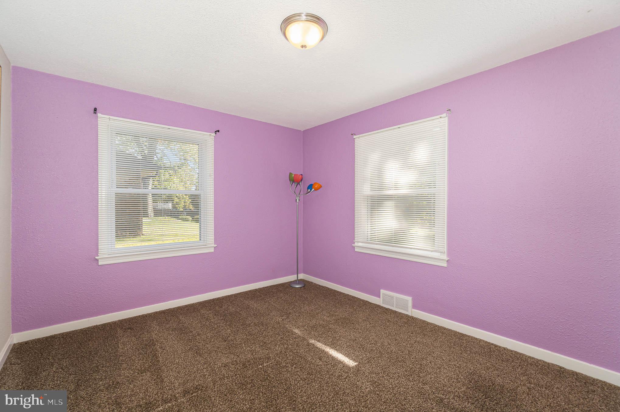 404 Beaumont Road York, PA 17403 - Photo 15 of 26 a view of a livingroom with an empty space and window
