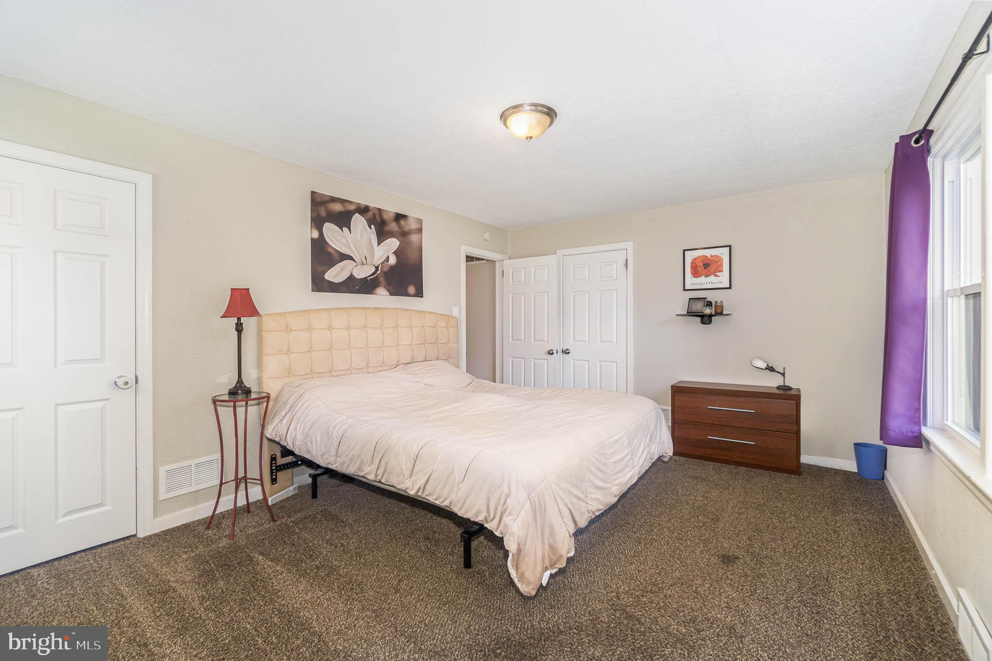 404 Beaumont Road York, PA 17403 - Photo 18 of 26 a bedroom with a bed and a couch
