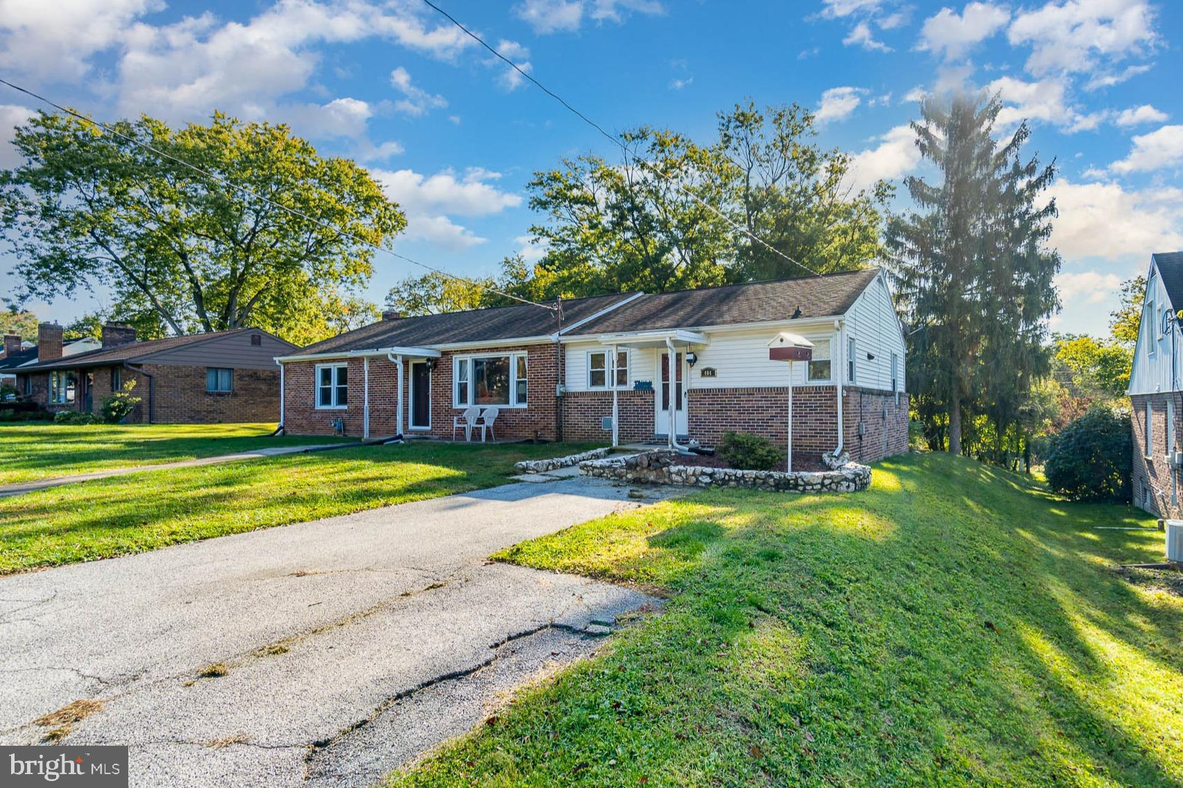 404 Beaumont Road York, PA 17403 - Photo 3 of 26 a view of a house with swimming pool and a yard