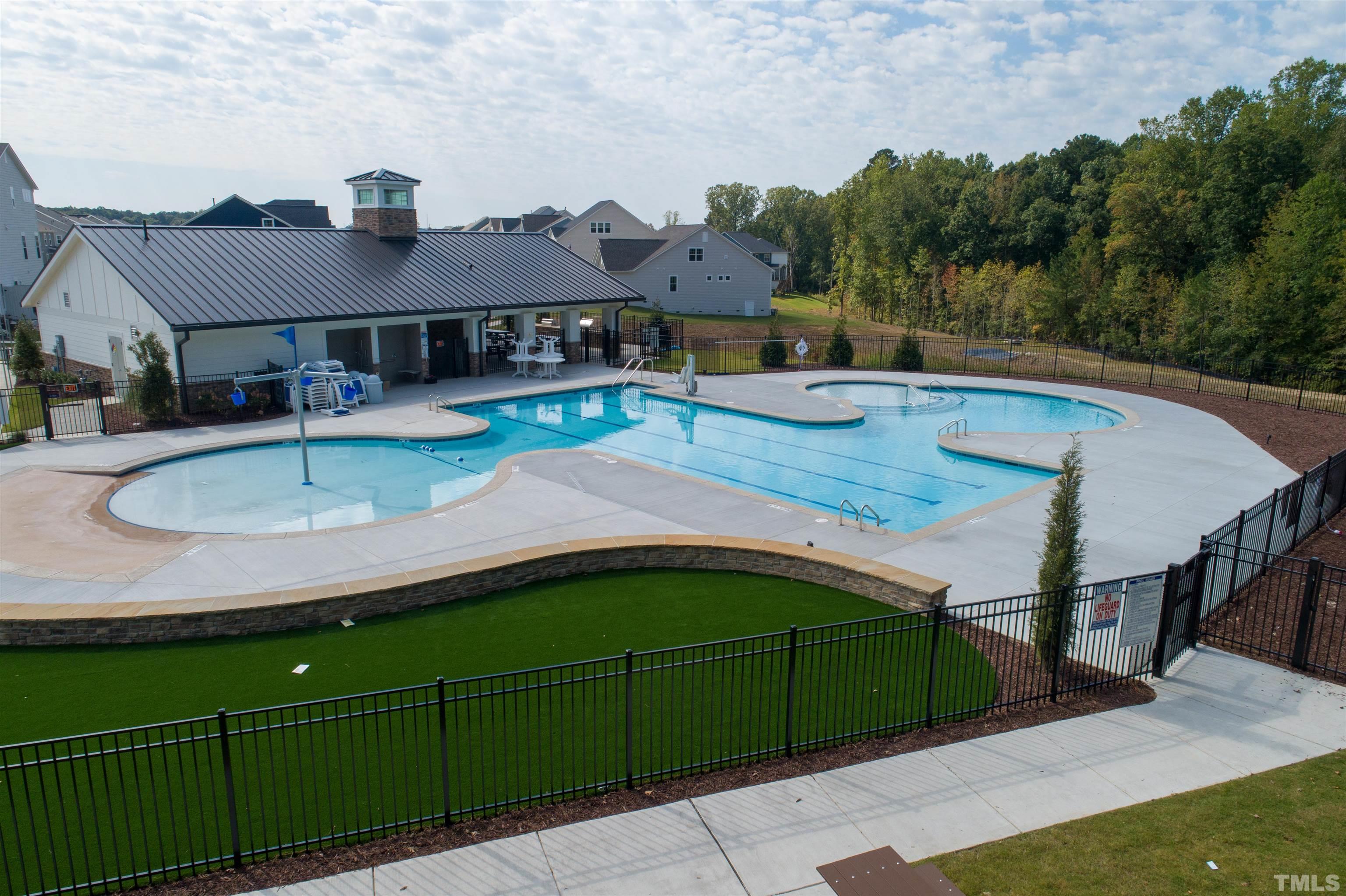 2387 Kettle Falls Station, Unit 222 Apex, NC 27502 - Photo 9 of 13 a view of house with outdoor space and swimming pool