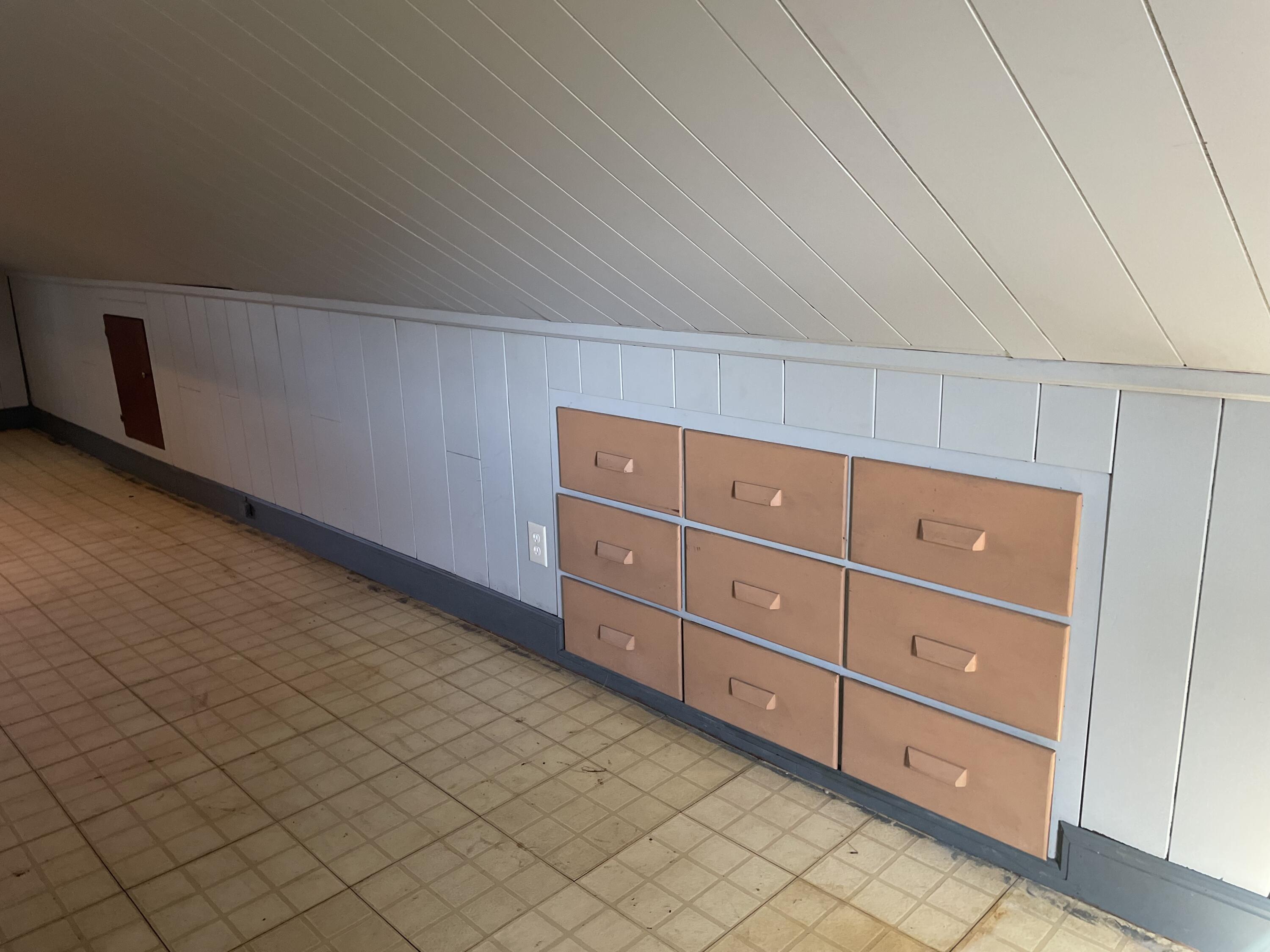 1152 Hamilton Avenue Southwest Roanoke, VA 24015 - Photo 32 of 36 a room with a dresser and a mirror