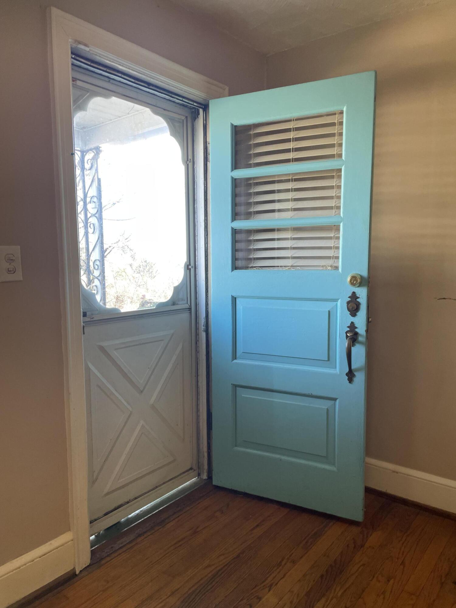 1152 Hamilton Avenue Southwest Roanoke, VA 24015 - Photo 9 of 36 a view of empty room with wooden floor and fan