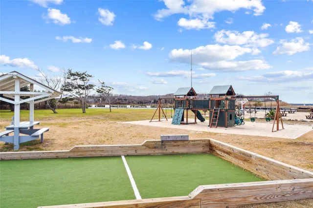 a view of a swimming pool with an ocean view