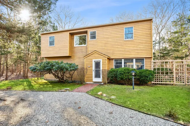 a view of an outdoor sitting area with furniture