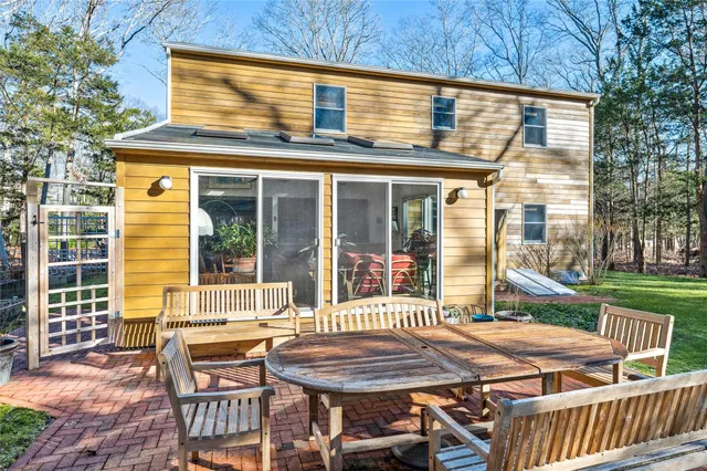 a view of a park with large trees