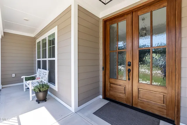 a view of an entryway with wooden door