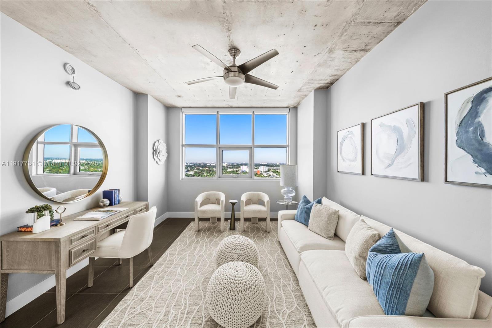 3301 Northeast 1st Avenue, Unit H2201 Miami, FL 33137 - Photo 13 of 46 a living room with furniture a mirror and a table