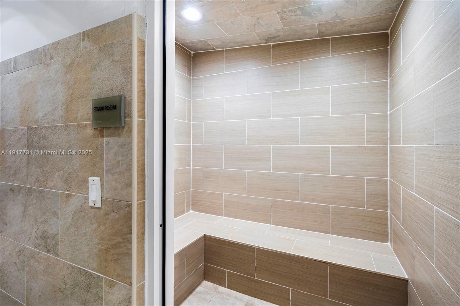 3301 Northeast 1st Avenue, Unit H2201 Miami, FL 33137 - Photo 45 of 46 a bathroom with a bathtub