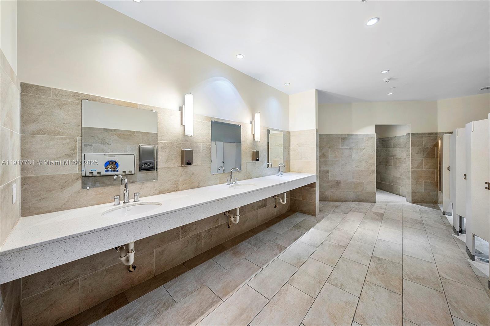 3301 Northeast 1st Avenue, Unit H2201 Miami, FL 33137 - Photo 46 of 46 a large bathroom with a double vanity sink and a mirror