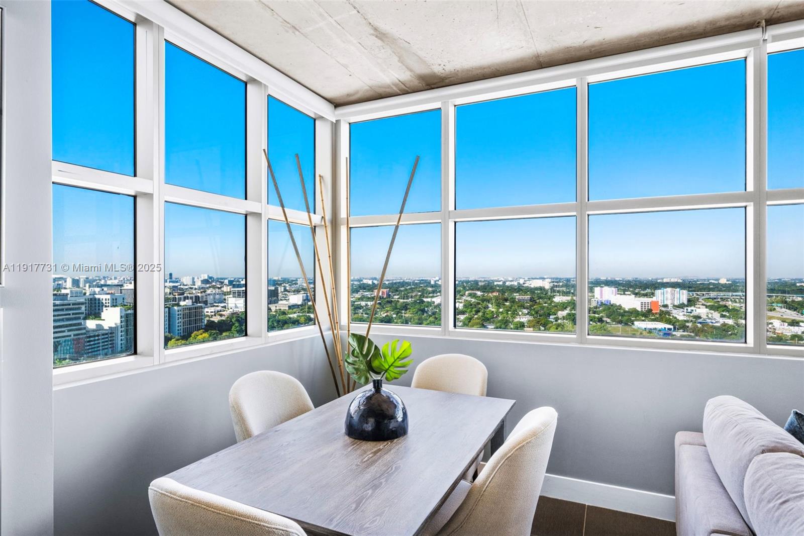 3301 Northeast 1st Avenue, Unit H2201 Miami, FL 33137 - Photo 9 of 46 a view of a dining room with furniture window and outside view