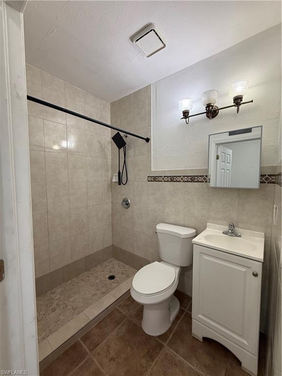 1964 42nd Street Southwest Naples, FL 34116 - Photo 19 of 25 a bathroom with a toilet sink and shower