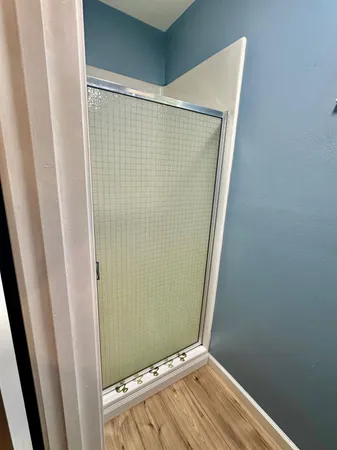 a view of livingroom with hardwood floor and a window