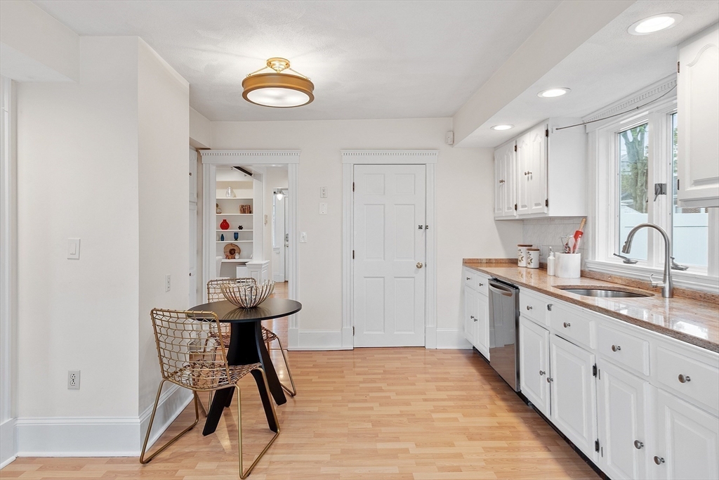 3 Baker Road Nahant, MA 01908 - Photo 14 of 41 a kitchen with stainless steel appliances a sink a stove a refrigerator and cabinets