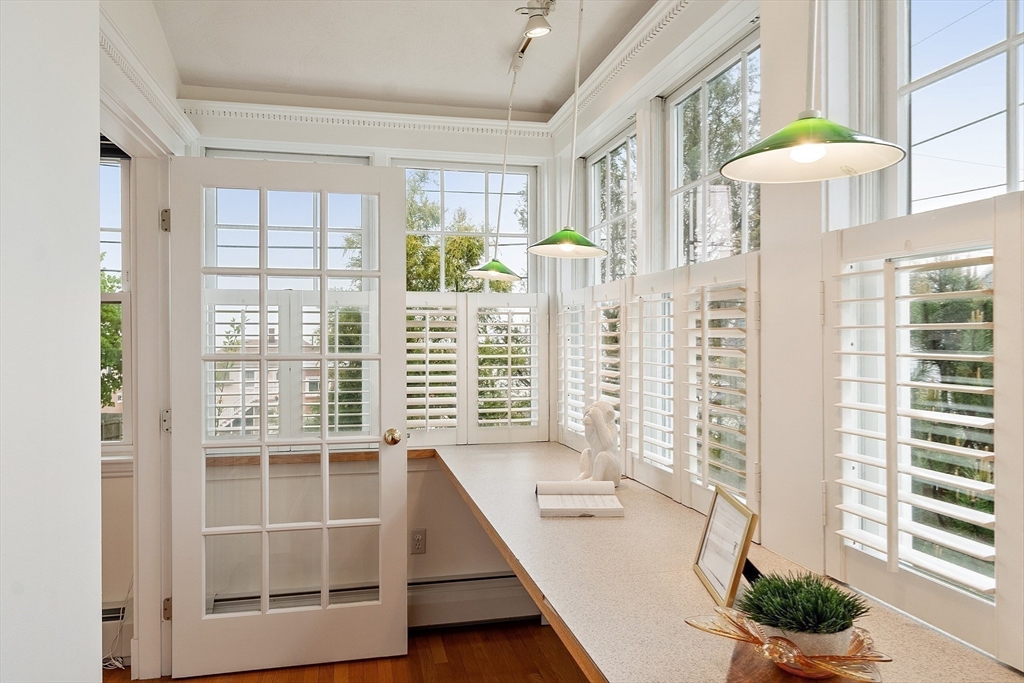 3 Baker Road Nahant, MA 01908 - Photo 16 of 41 a balcony with furniture and a potted plant