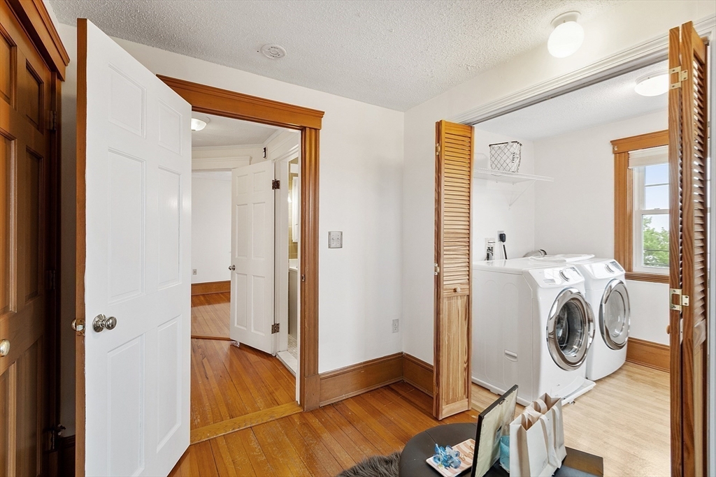 3 Baker Road Nahant, MA 01908 - Photo 20 of 41 a view of walk in closet with wooden floor