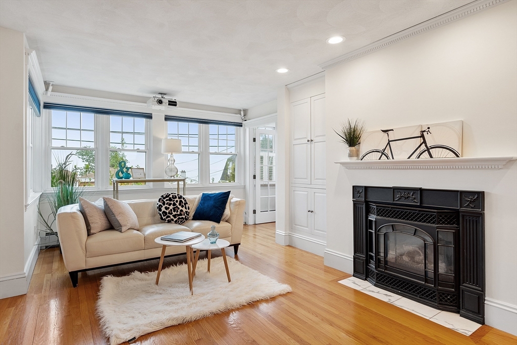 3 Baker Road Nahant, MA 01908 - Photo 2 of 41 a living room with furniture and a fireplace