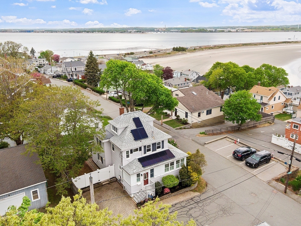 3 Baker Road Nahant, MA 01908 - Photo 4 of 41 a view of a house with outdoor space and ocean view