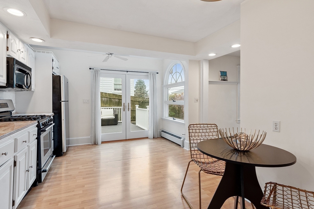 3 Baker Road Nahant, MA 01908 - Photo 8 of 41 a kitchen with stainless steel appliances kitchen island granite countertop a sink and cabinets