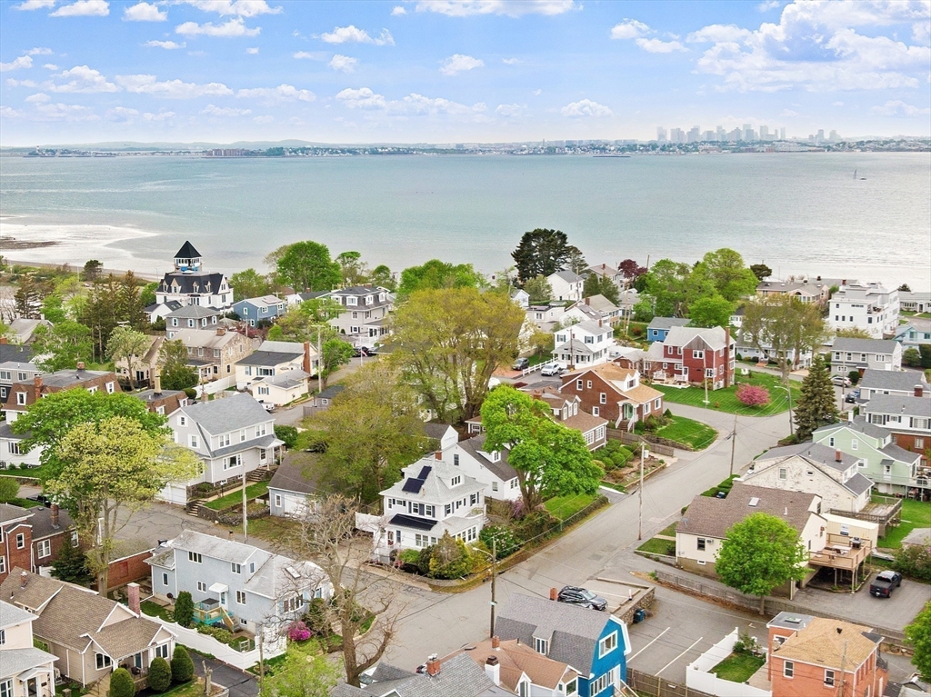 3 Baker Road Nahant, MA 01908 - Photo 10 of 41 an aerial view of a city with lots of residential buildings ocean and mountain view in back
