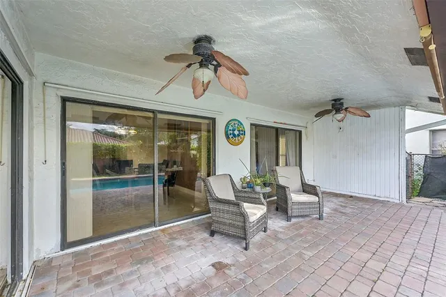 a view of a livingroom with furniture and window