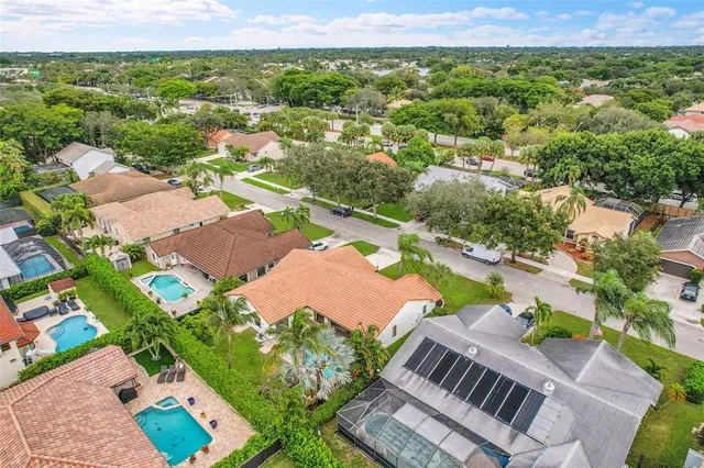an aerial view of a house with a garden