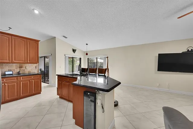 a kitchen with counter top space cabinets and stainless steel appliances
