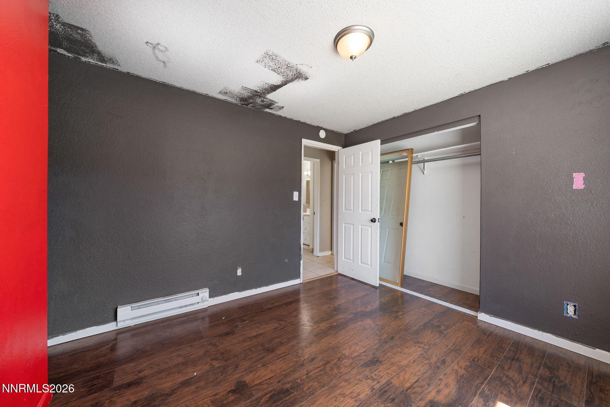 3590 Siskin Lane Reno, NV 89508 - Photo 14 of 31 a view of room with wooden floor