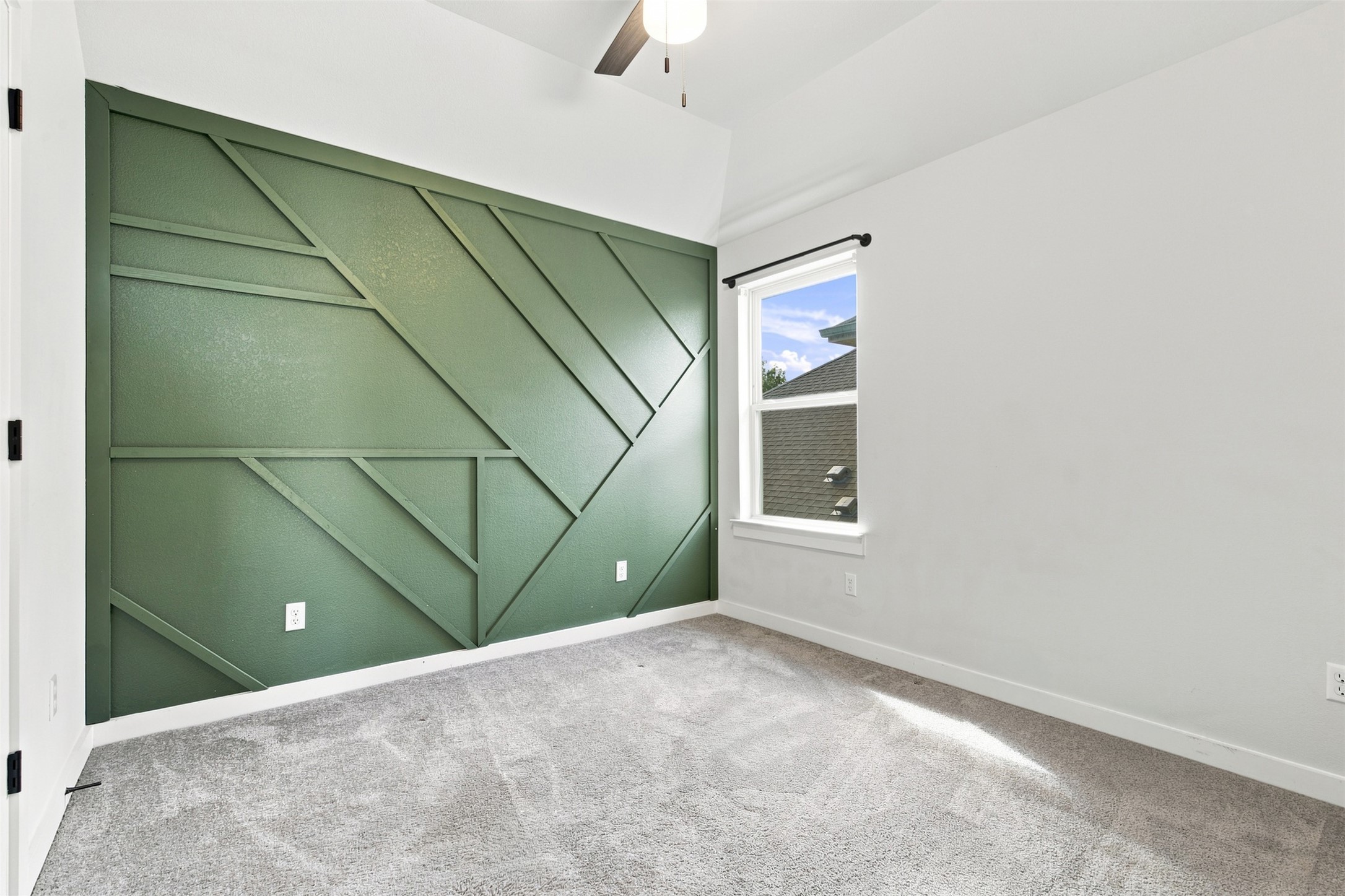 336 Berkeley Place Georgetown, TX 78628 - Photo 24 of 36 Geometric wall detailing and plush carpeting define this versatile secondary bedroom space.