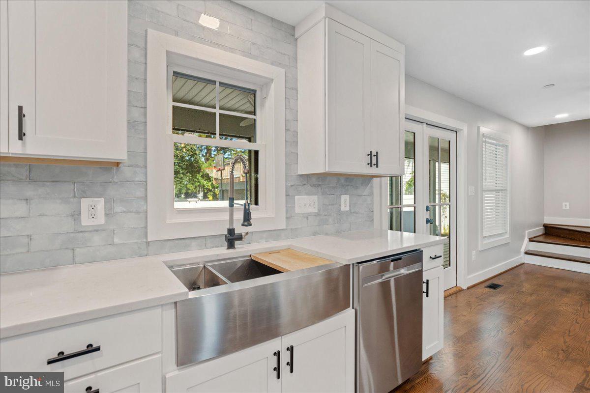 206 Point Lane Solomons, MD 20688 - Photo 14 of 46 Nice deep stainless steel sink with shelving