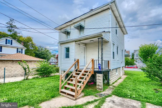 a front view of a house with balcony