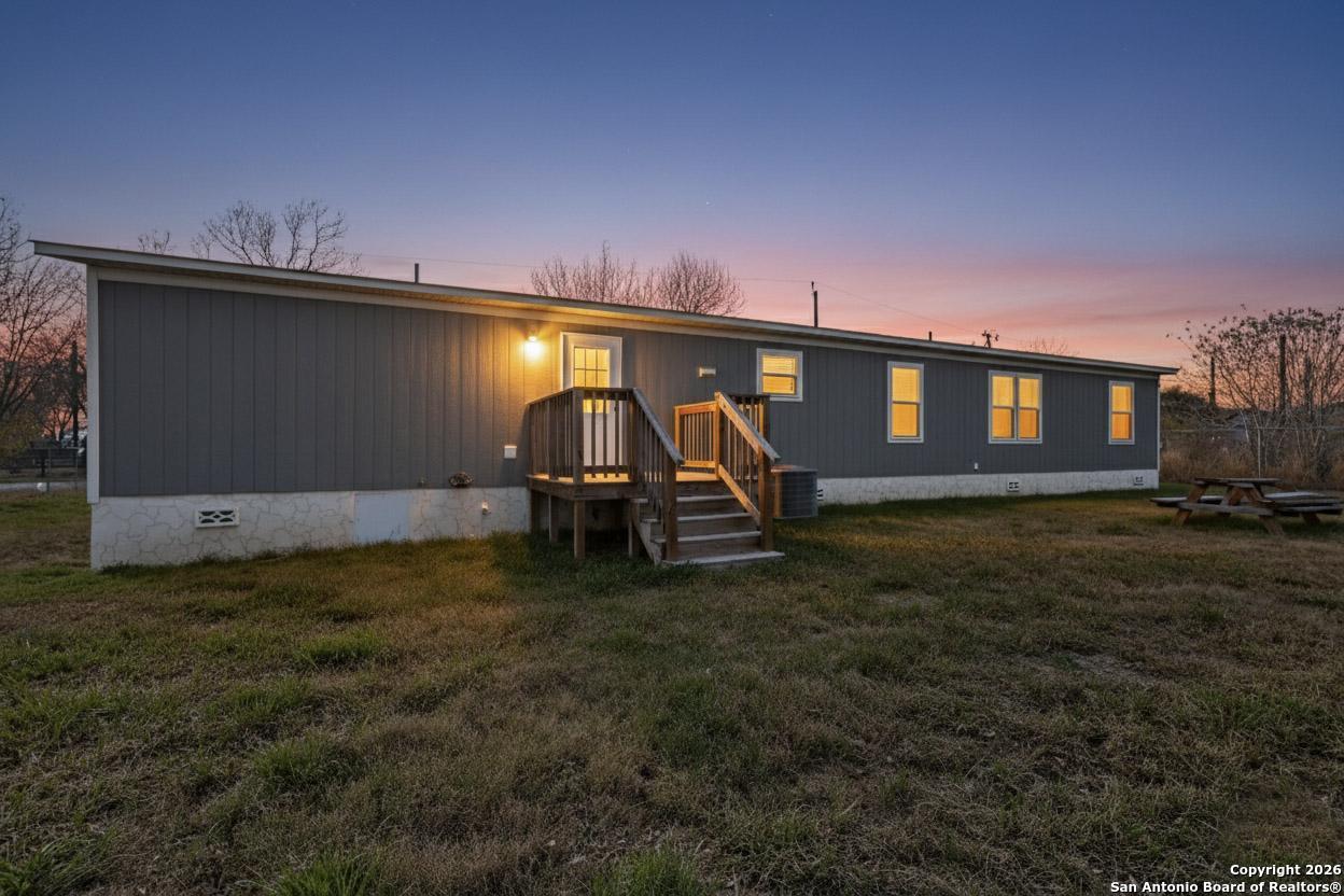 19124 La Gloria Road Elmendorf, TX 78112 - Photo 43 of 45 a view of a livingroom with furniture and staircase