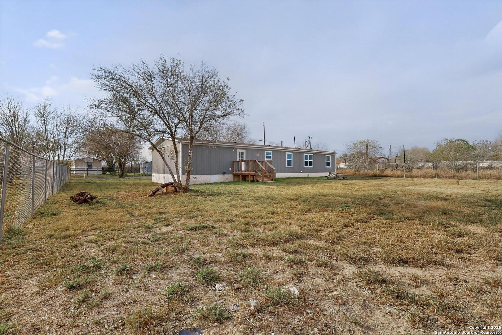 19124 La Gloria Road Elmendorf, TX 78112 - Photo 44 of 45 a view of yard with lake view