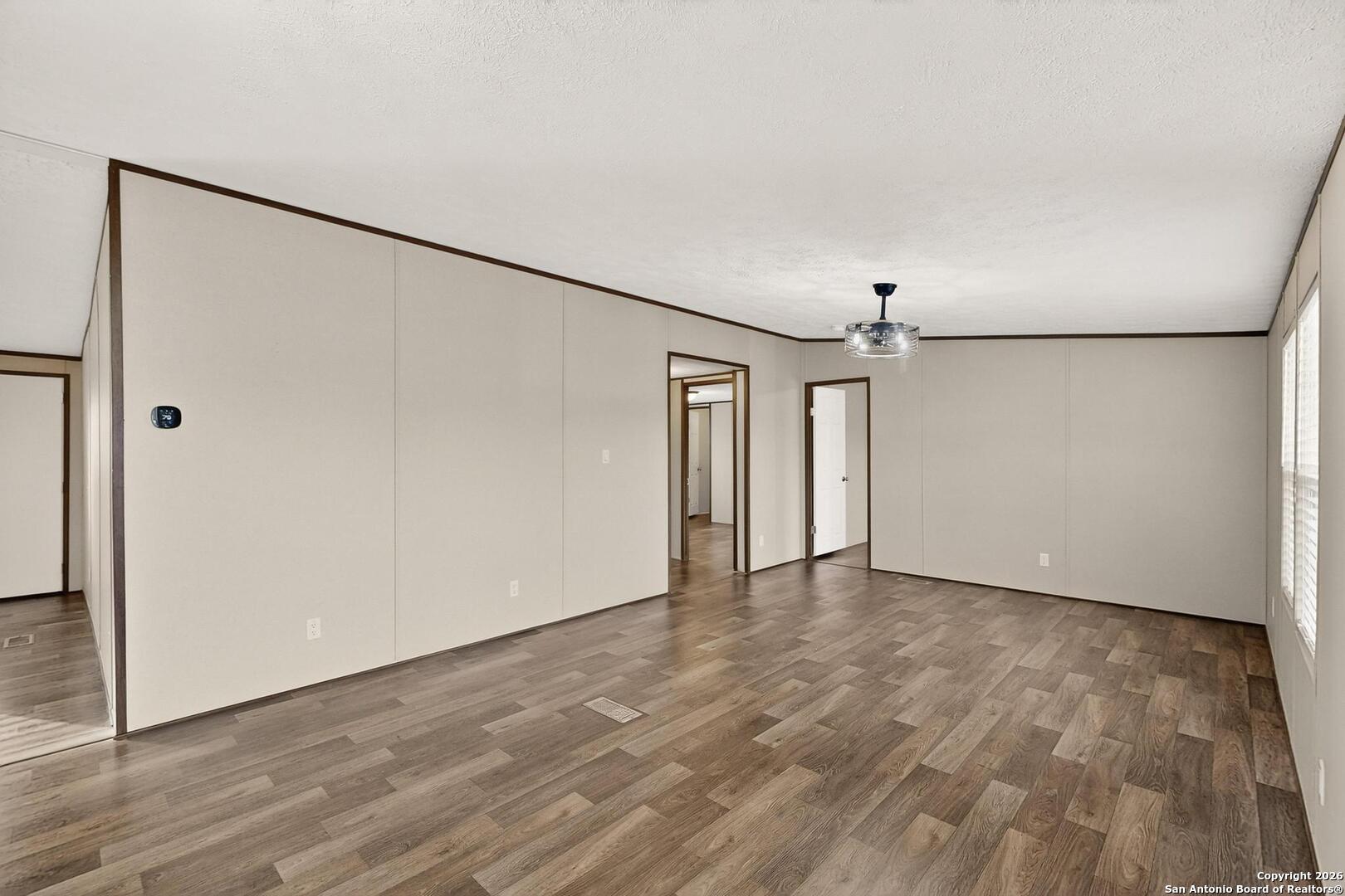 19124 La Gloria Road Elmendorf, TX 78112 - Photo 9 of 45 a view of an empty room