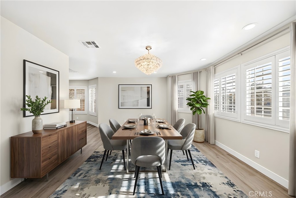 19361 Plummer Street Northridge, CA 91324 - Photo 17 of 42 a view of a livingroom with furniture window and wooden floor