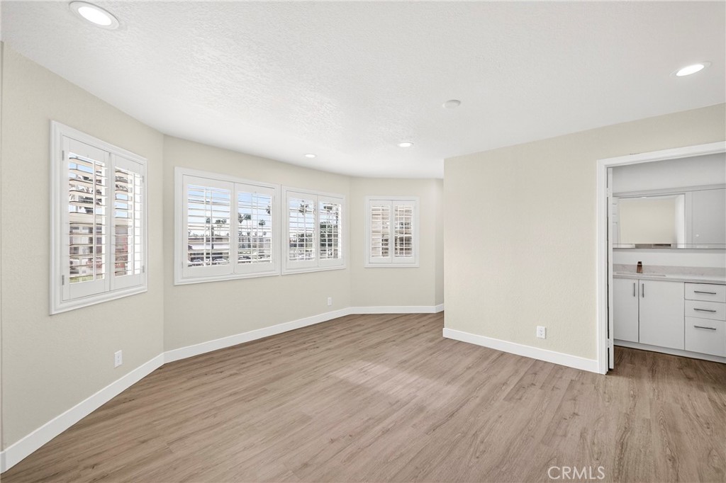 19361 Plummer Street Northridge, CA 91324 - Photo 37 of 42 wooden floor in an empty room with a window