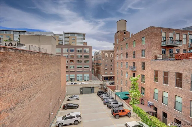 a front view of a building with street view