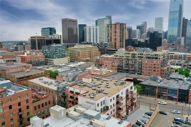 a view of a city with tall buildings