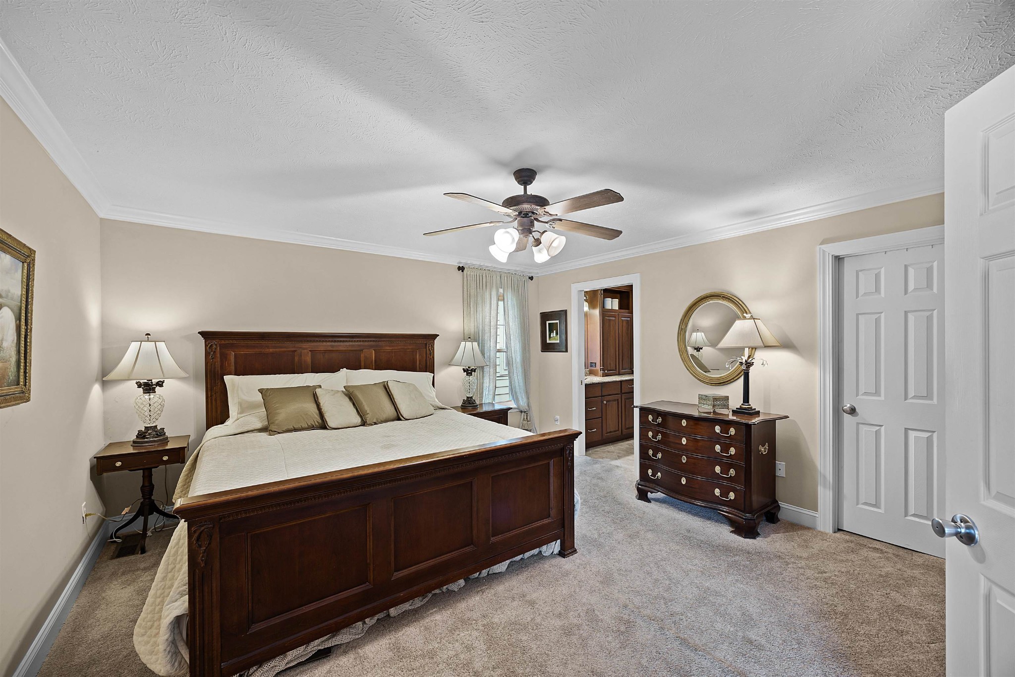 40 Vantage Pointe Counce, TN 38326 - Photo 11 of 25 a bedroom with a bed a chandelier and a dresser