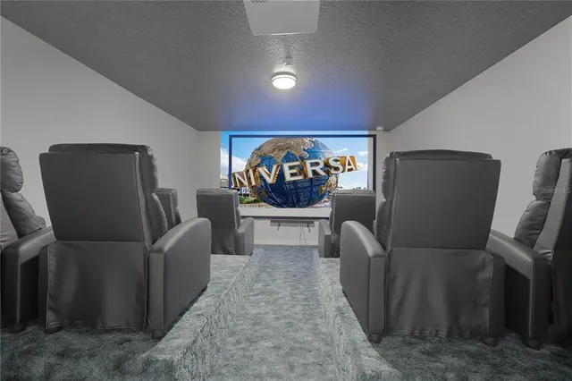 an empty room with wooden floor and a ceiling fan