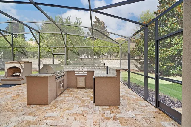a view of a swimming pool with an outdoor space and seating area