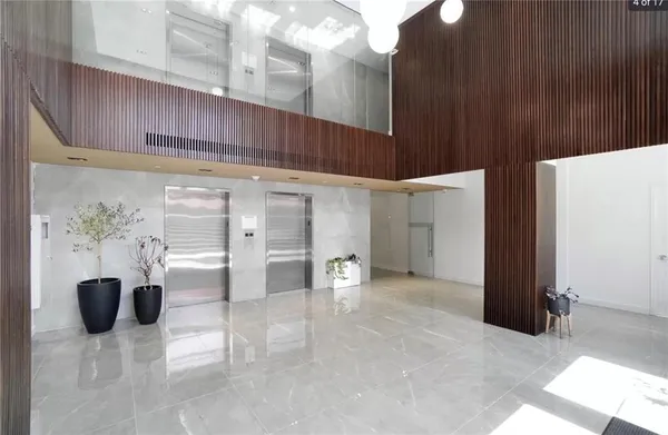 a view of an entryway with wooden walls