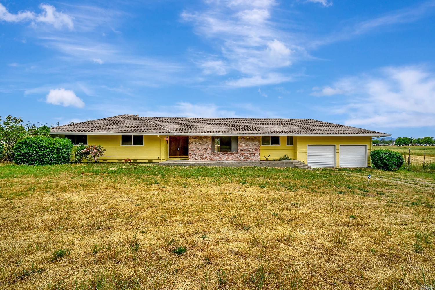 777 Piezzi Road Santa Rosa, CA 95401 - Photo 1 of 1 a front view of a house with a yard