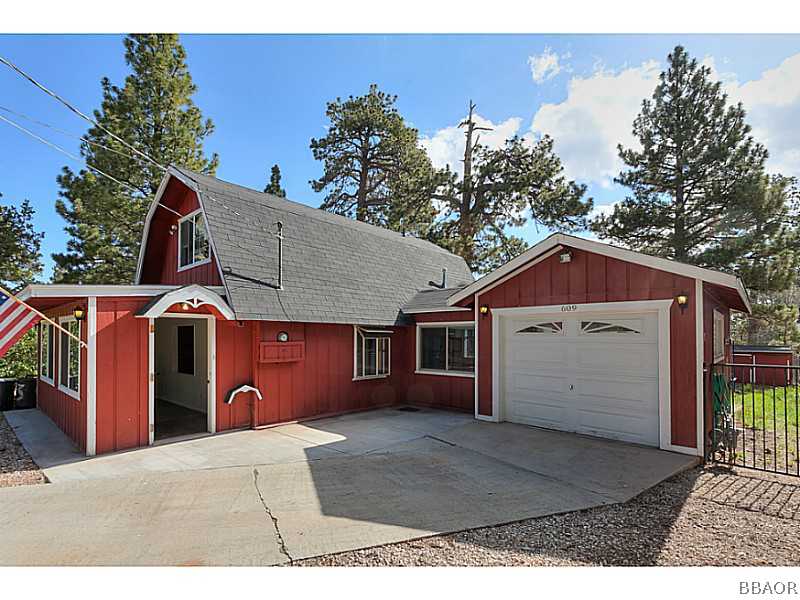 609 Riverside Avenue Sugarloaf, CA 92386 - Photo 3 of 25 a view of a house with a yard