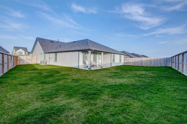 a house view with garden space