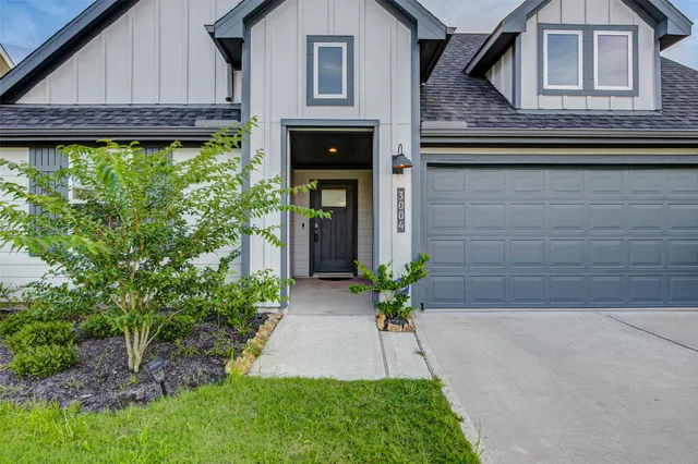 a front view of a house with a porch