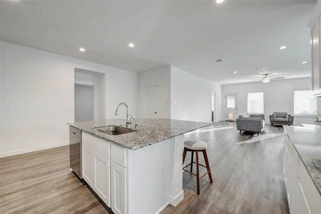 a very nice looking kitchen with a large counter space