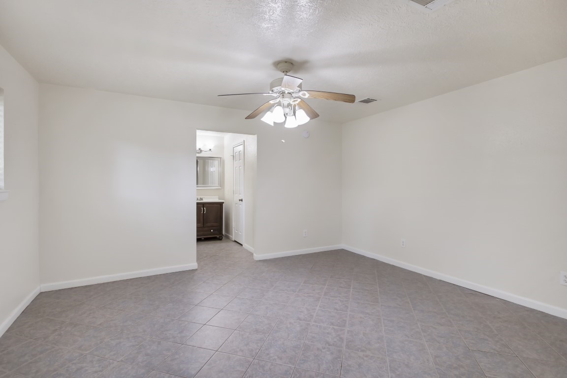 3203 Willie Way Spring, TX 77380 - Photo 21 of 31 a view of an empty room with a window