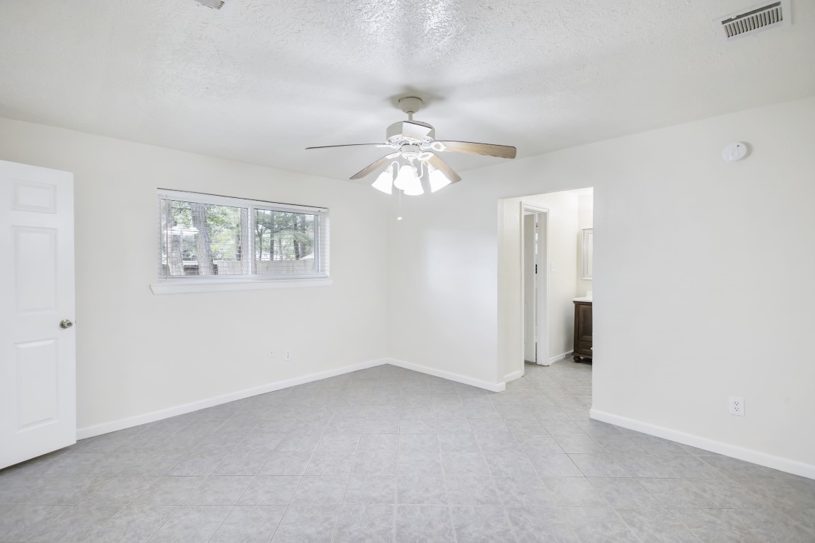 3203 Willie Way Spring, TX 77380 - Photo 22 of 31 a view of an empty room with a window